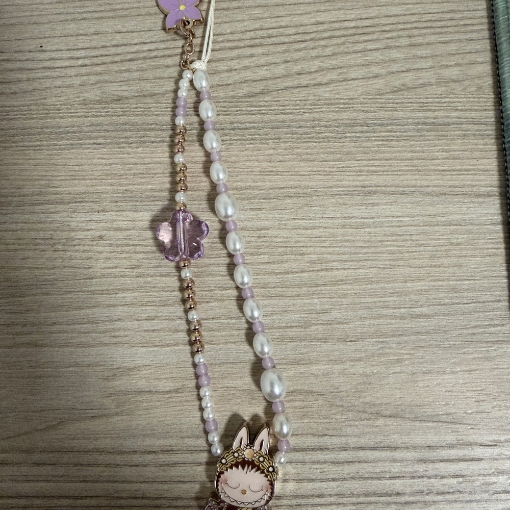 Labubu phone charm Thailand purple pop mart